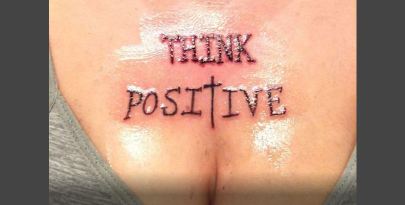 think positive chest tattoo, think positive breast tattoo, think positive boob tattoo, think positive tattoo, chest tattoo, cleavage tattoo, breast tattoo, chest tattoos, breast tattoos, cleavage tattoos